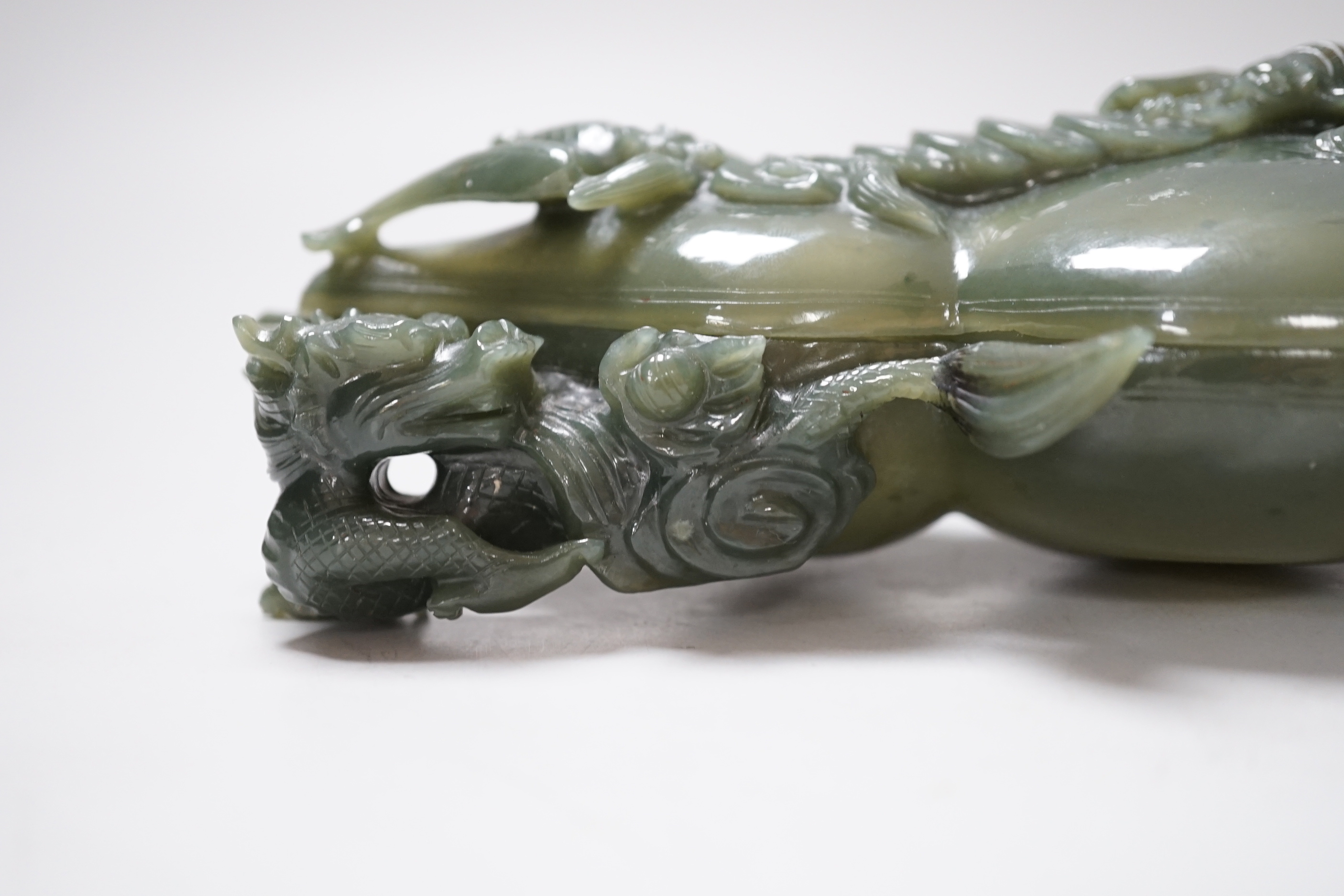 A Chinese spinach green jade double gourd shaped box and cover, 17cm